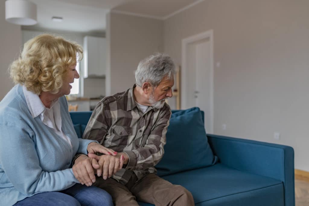 Senior Husband and Wife Arguing With Each Other and Try to Resolve Family Conflict. Mature Couple in Quarrel. Concept of Misunderstanding and Communicative Problem Between Two Senior People