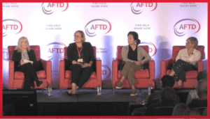 Photo: Alinka Fisher, PhD; Laura Mitic, PhD; Regina Shin, PhD, and Debra Niehoff, PhD, sitting onstage while presenting.