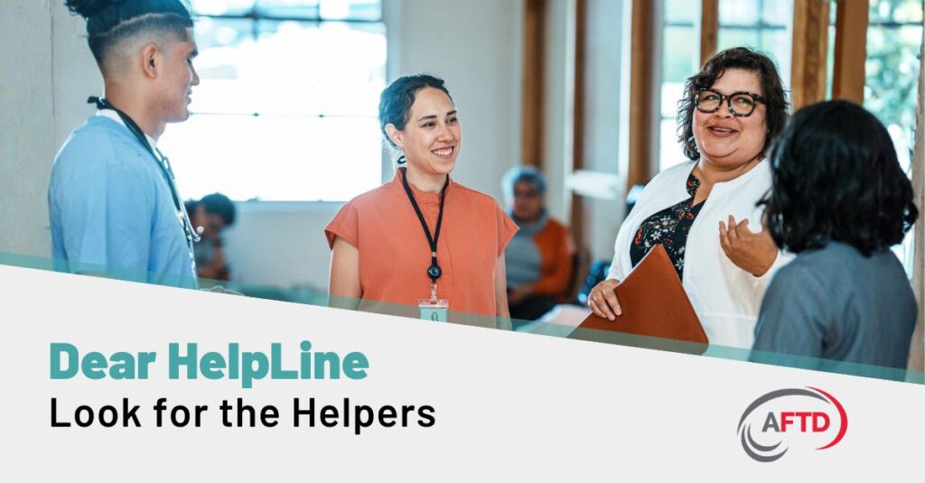 Graphic Text:Dear HelpLine - Look For the Helpers | Background: A group of varied medical professionals discuss matters with an FTD care partner