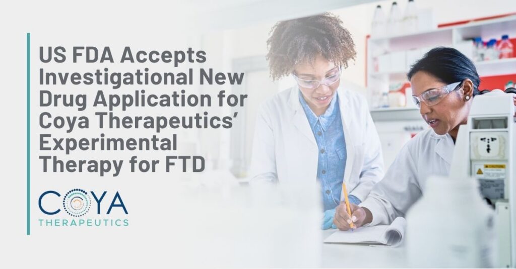 Graphic Text: US FDA Accepts Investigational New Drug Application for Coya Therapeutics’ Experimental Therapy for FTD | Background: A pair of female scientists work in a lab setting.